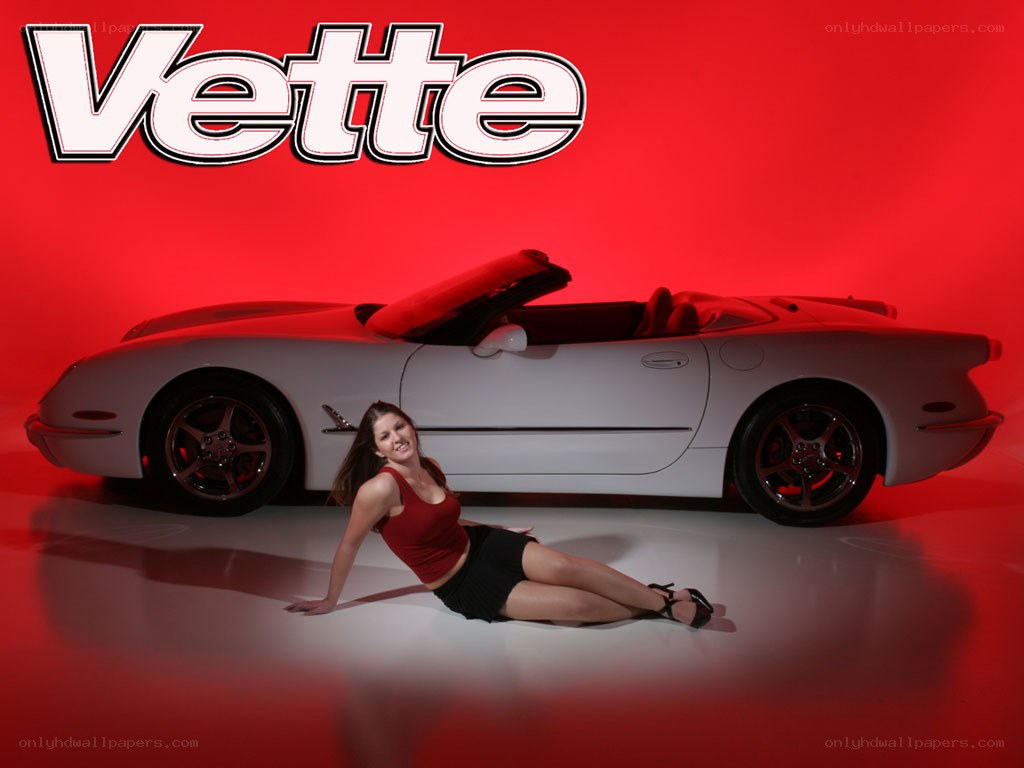Woman posing with white convertible