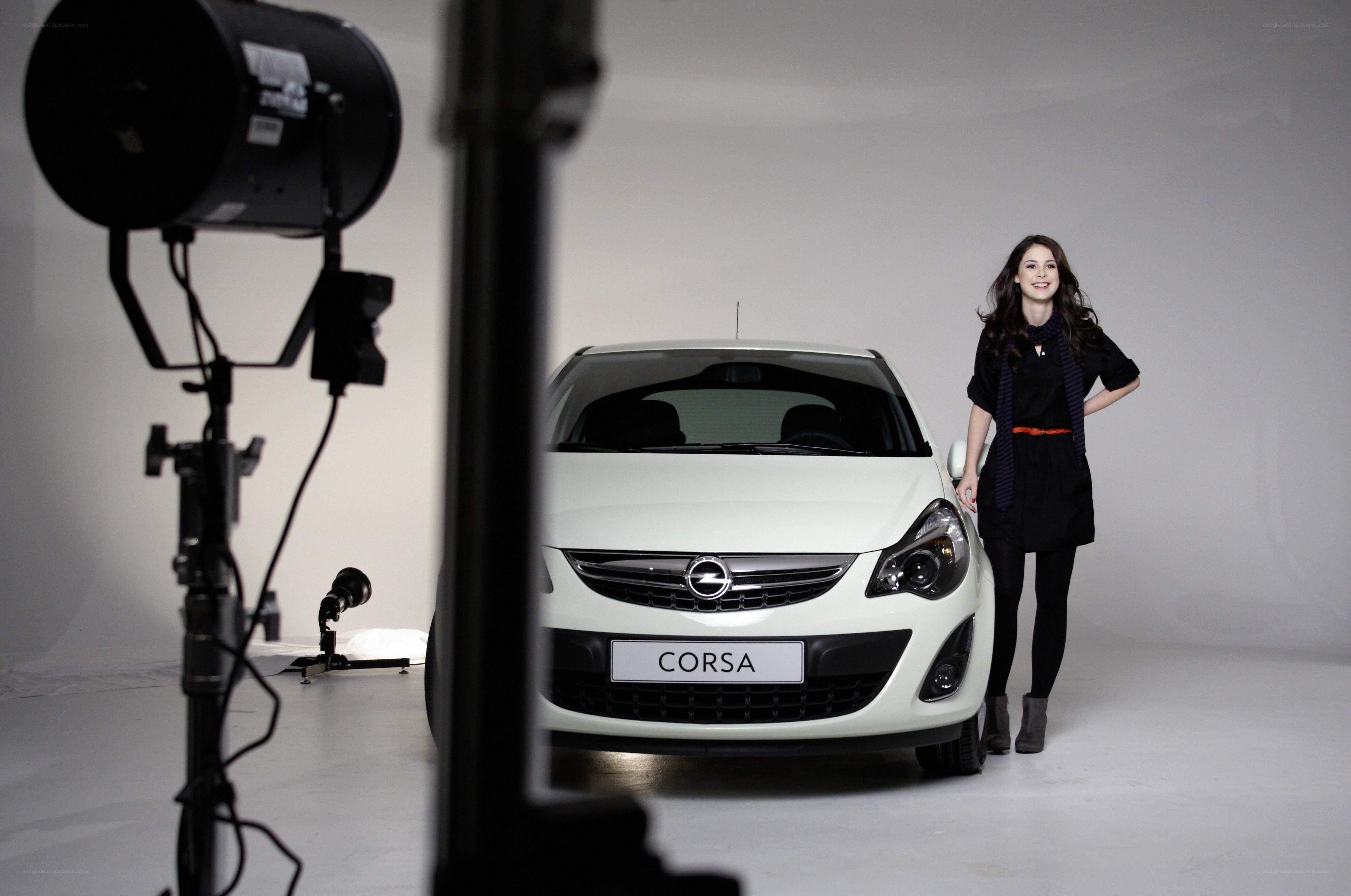 Woman posing with white Corsa