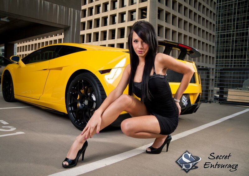 woman posing with yellow car