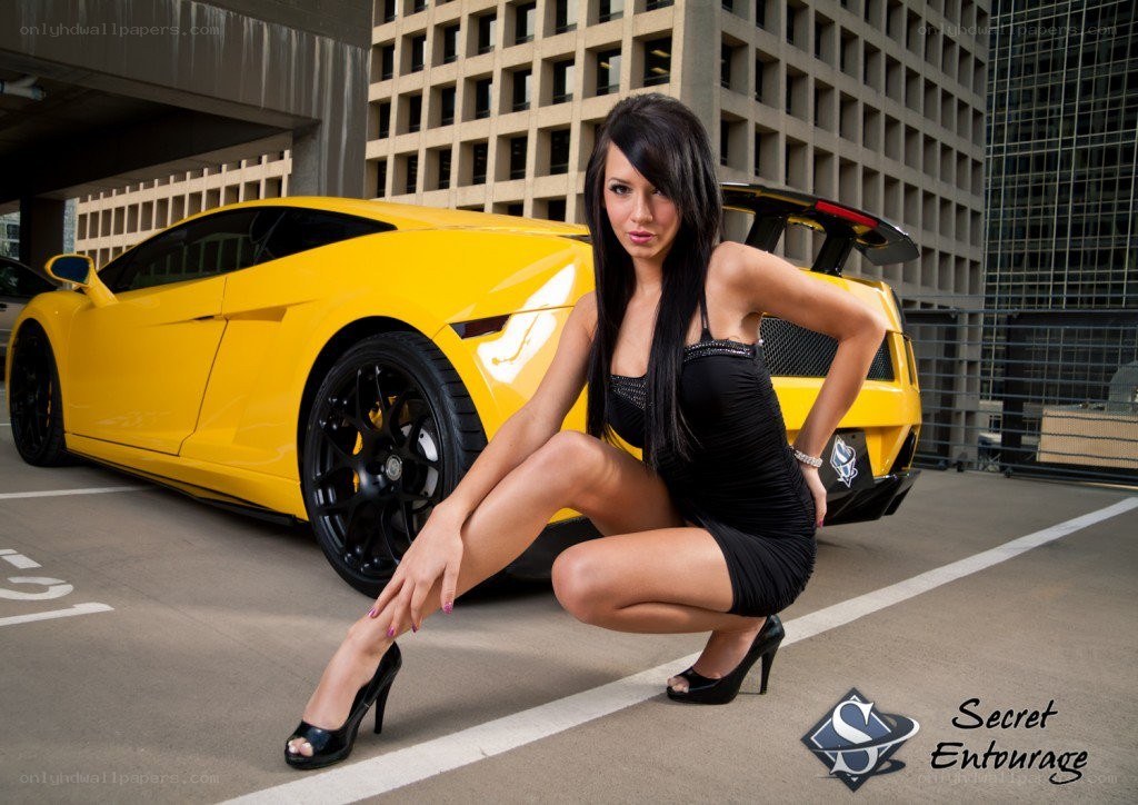 woman posing with yellow car