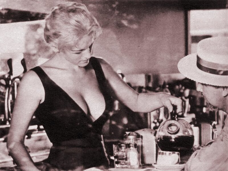 woman pouring coffee at counter