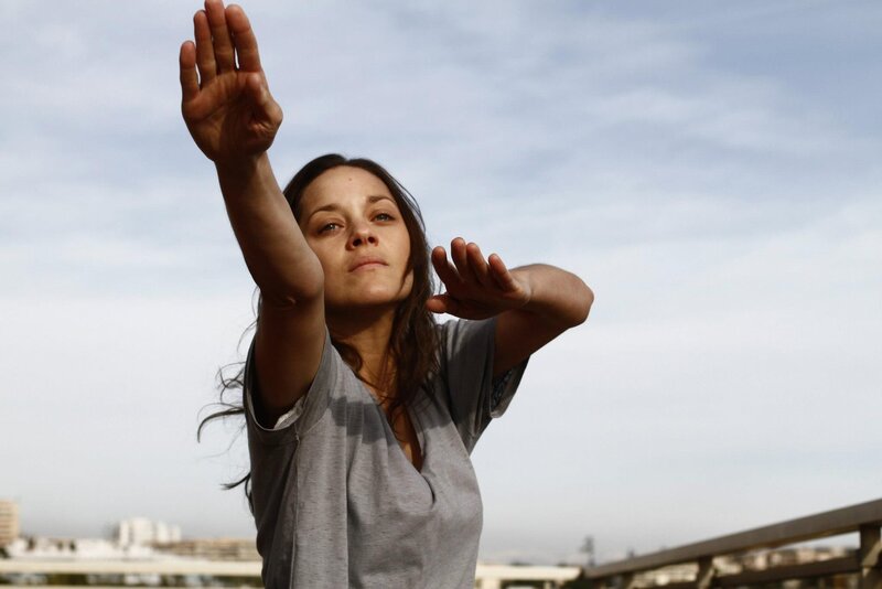 woman practicing martial arts outdoors