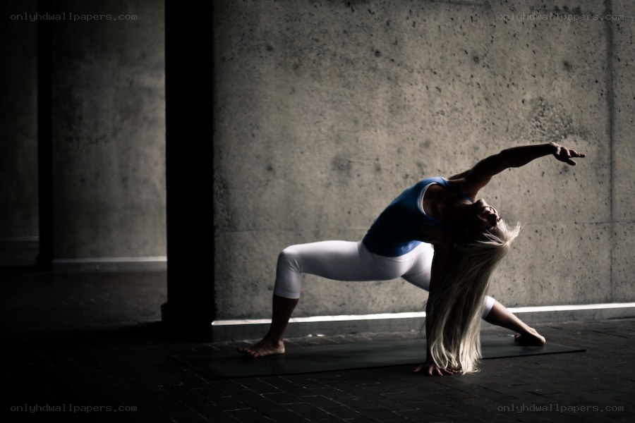 woman practicing yoga pose