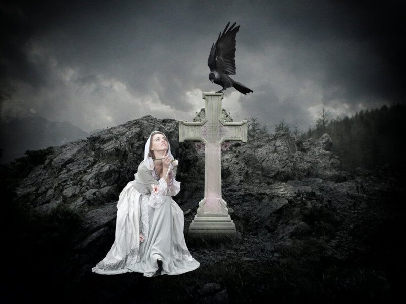Woman Praying at Cross