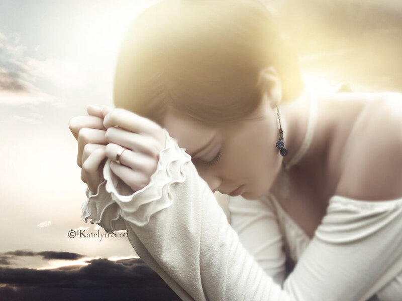 Woman Praying Outdoors