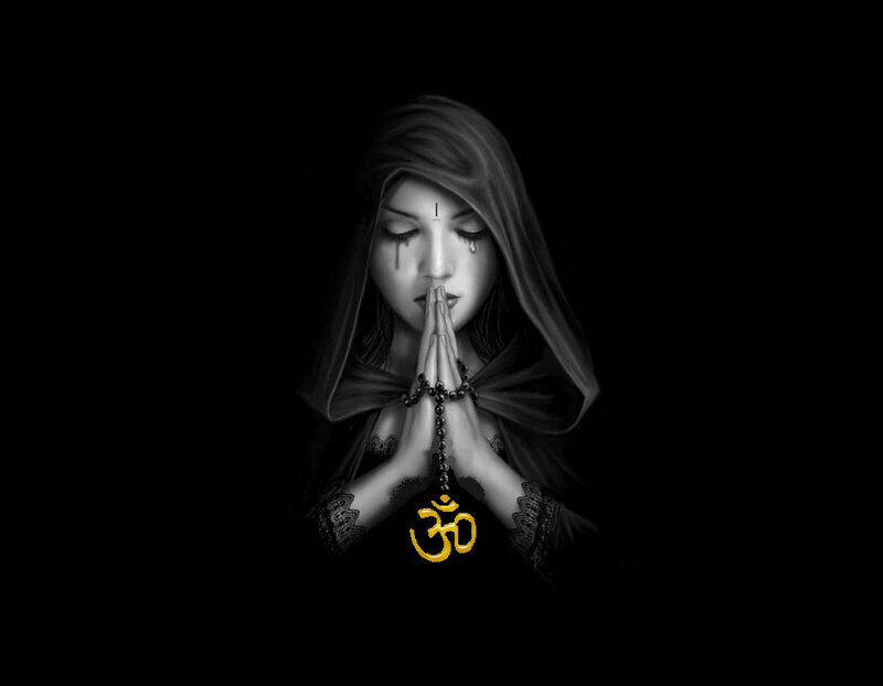 woman praying with om symbol