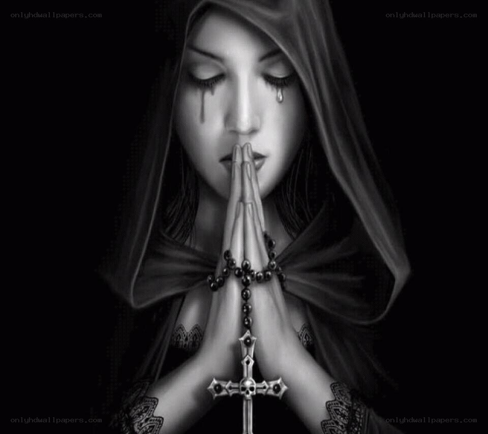 woman praying with tears