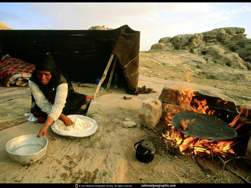 Woman preparing food outdoors