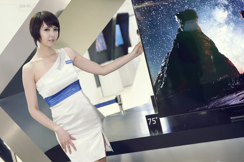 Woman presenting Samsung TV