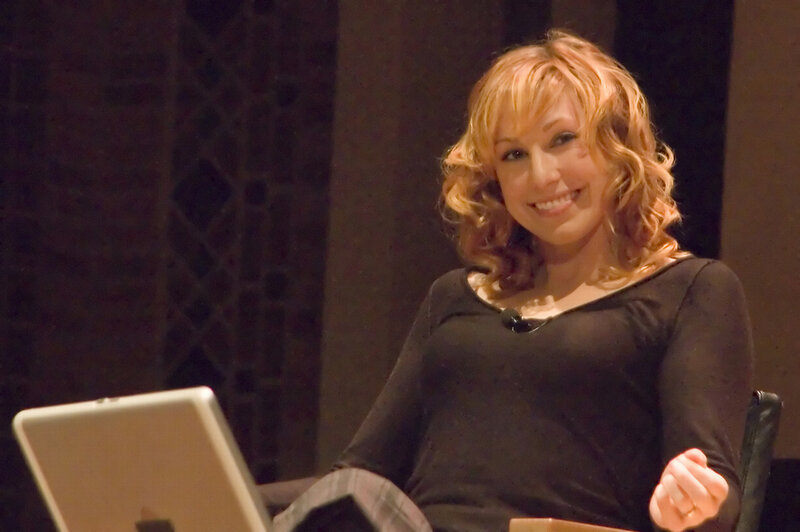 Woman presenting with laptop