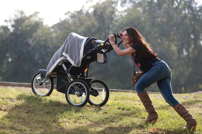 Woman Pushing Stroller — Green