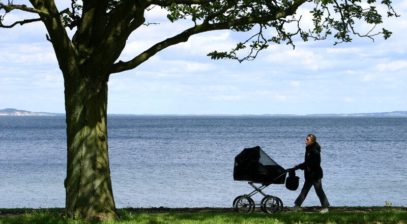 Woman Pushing Stroller