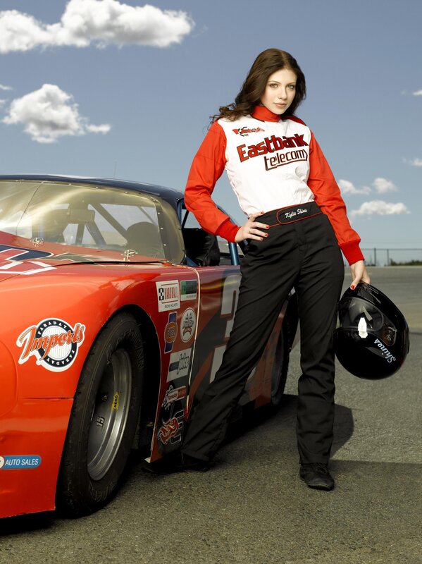 woman racing driver with car