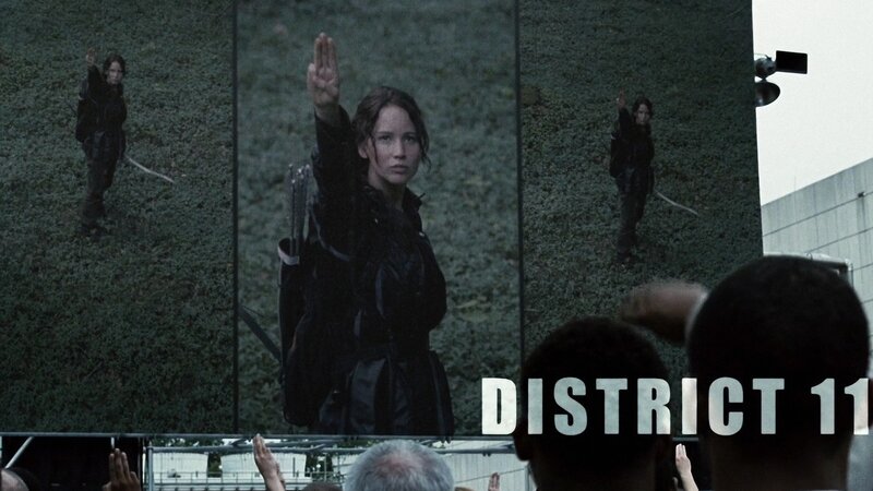 Woman Raising Hand on Screen