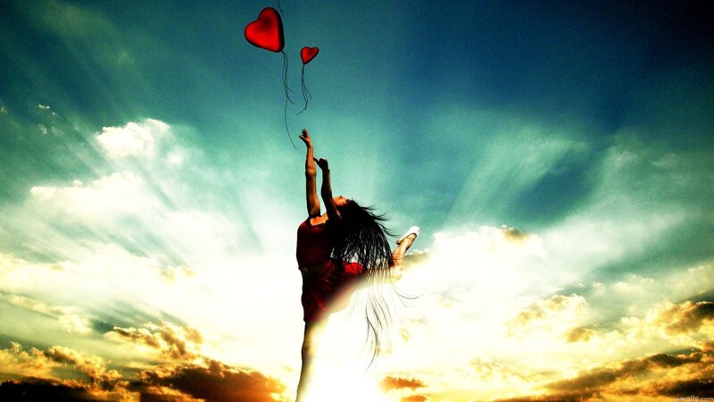 Woman Reaching for Balloons