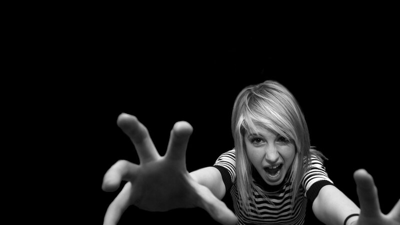 woman reaching out in fear