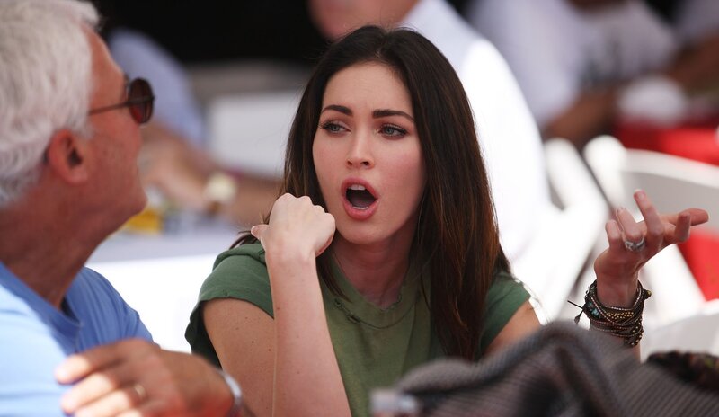 woman reacting to man