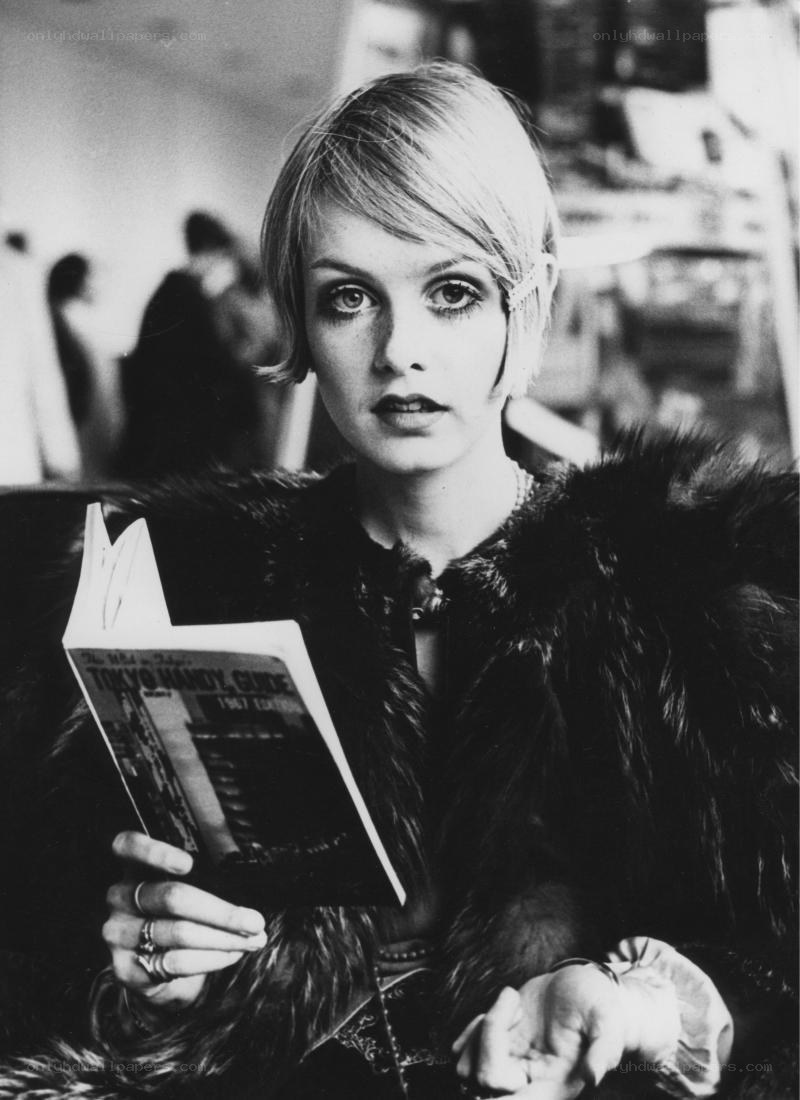 Woman reading a guidebook