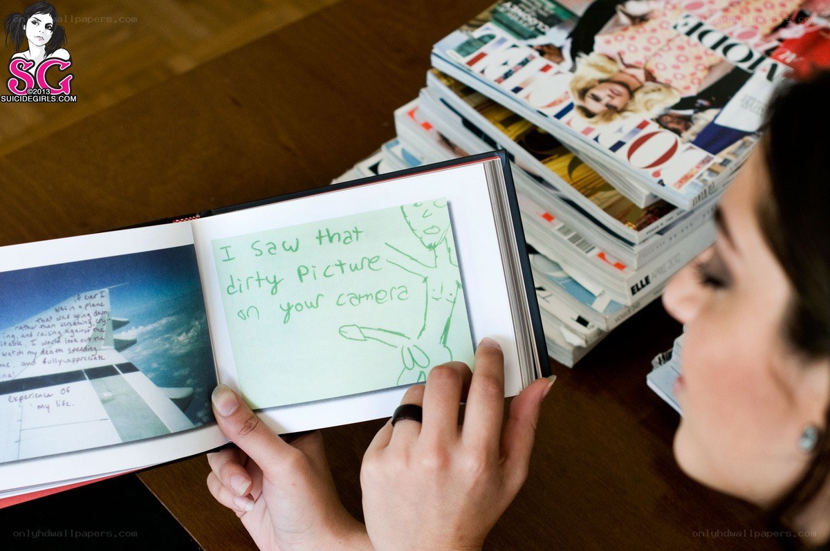 woman reading a journal