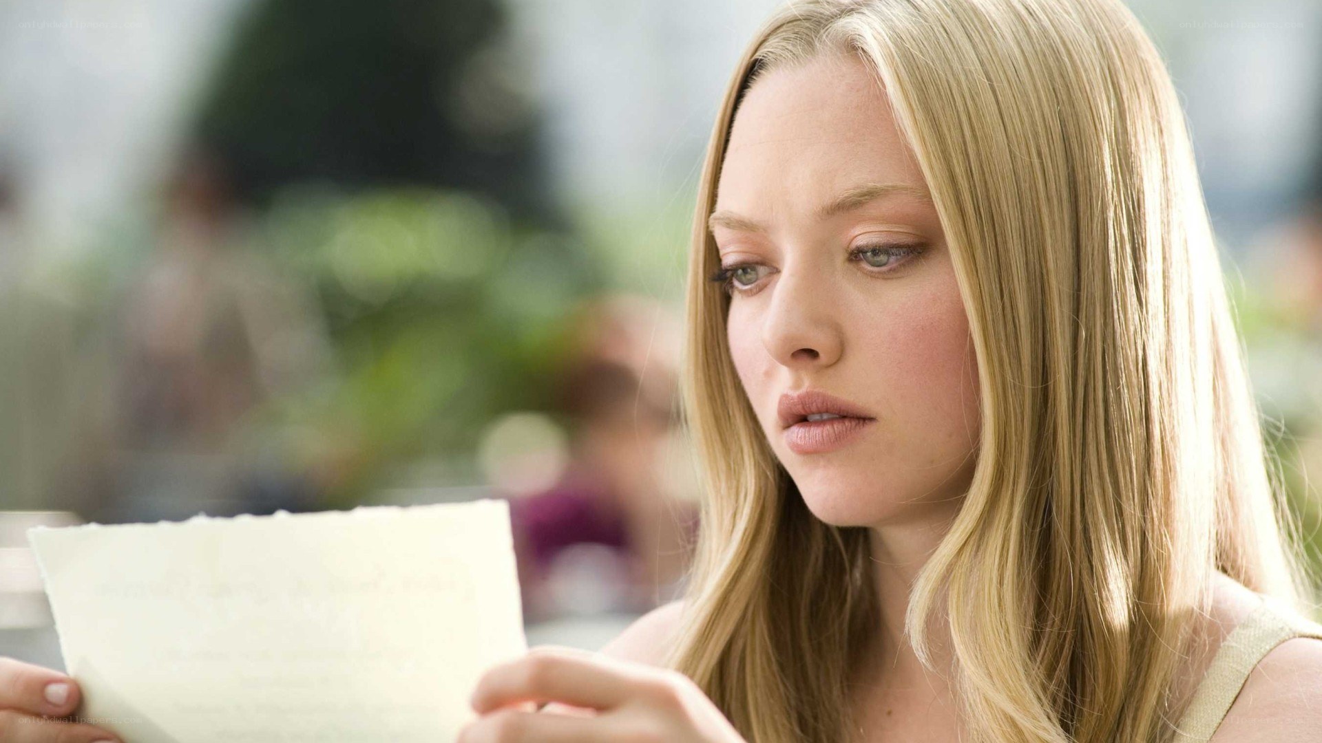 woman reading a letter