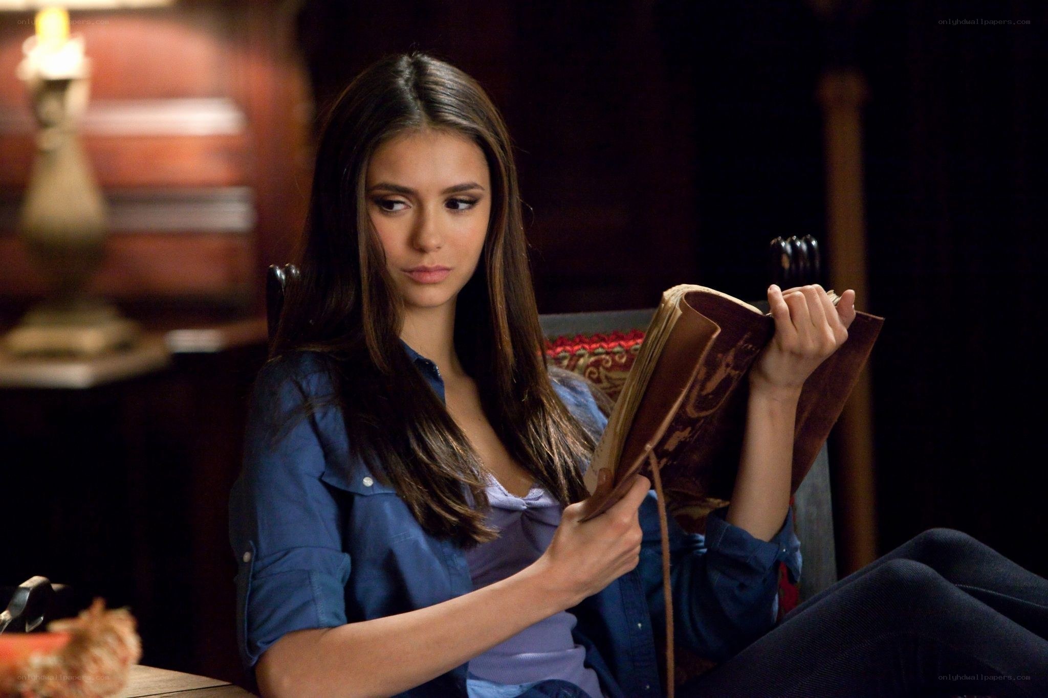 woman reading an old book