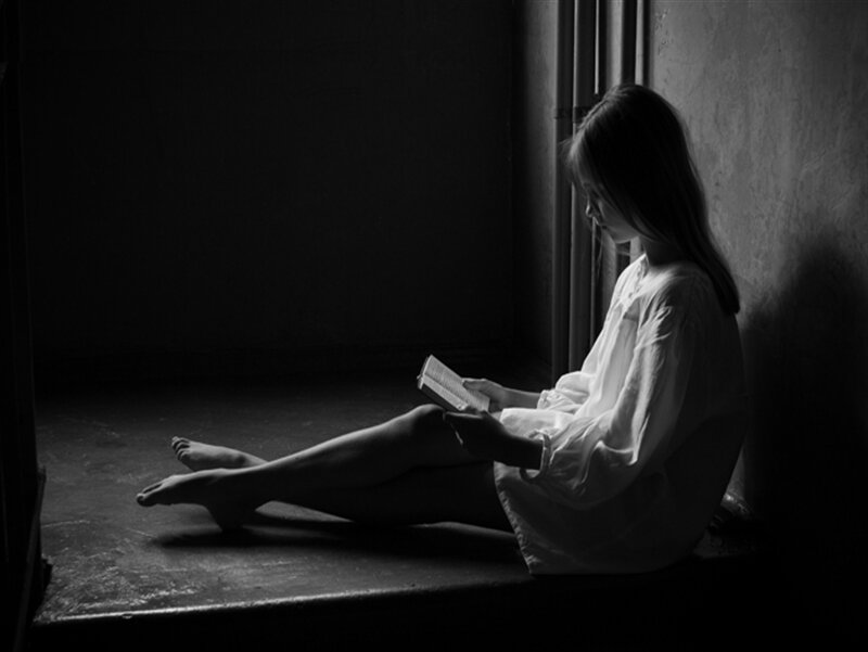 Woman Reading Book — Black, Dramatic, Night, Photograph