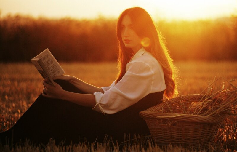 Woman Reading Book — Gold, Serene, Sunset