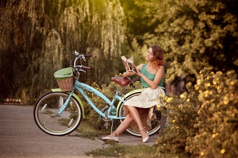Woman Reading Book — Green, Serene, Afternoon, Photograph, Bicycle
