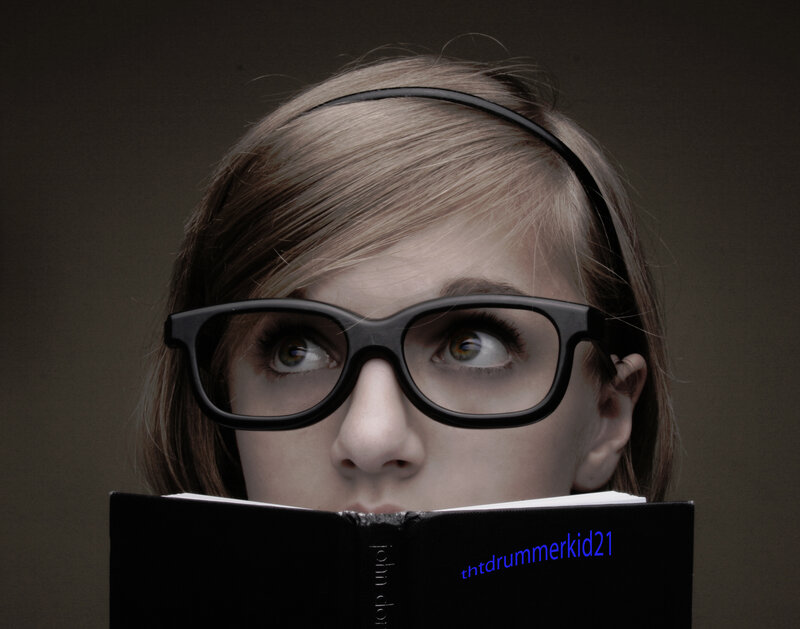 woman reading book with glasses