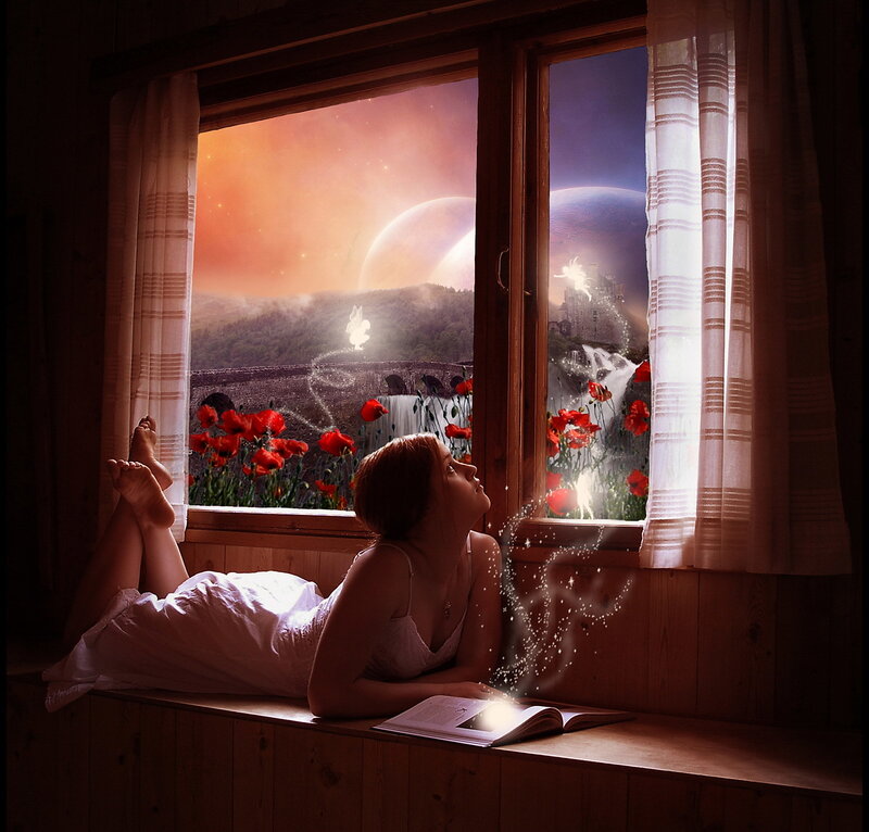woman reading by window