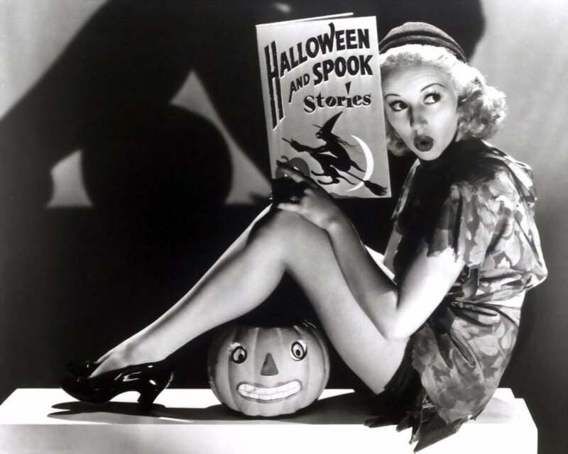 Woman reading Halloween book