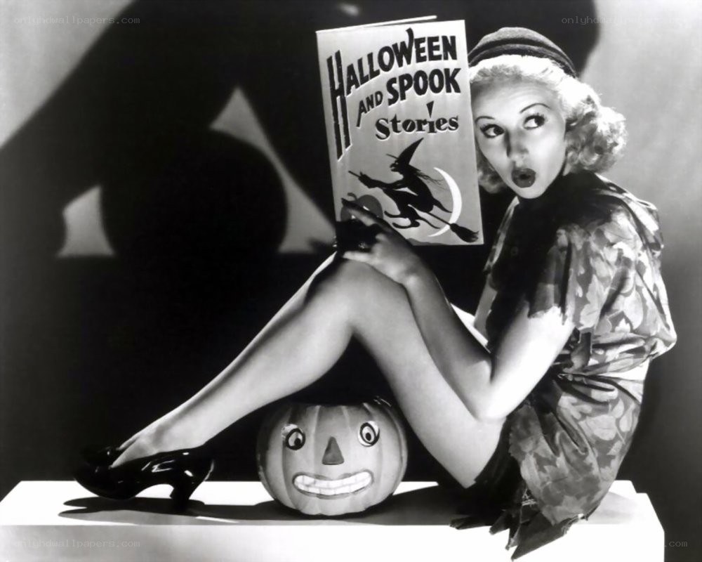 Woman reading Halloween book