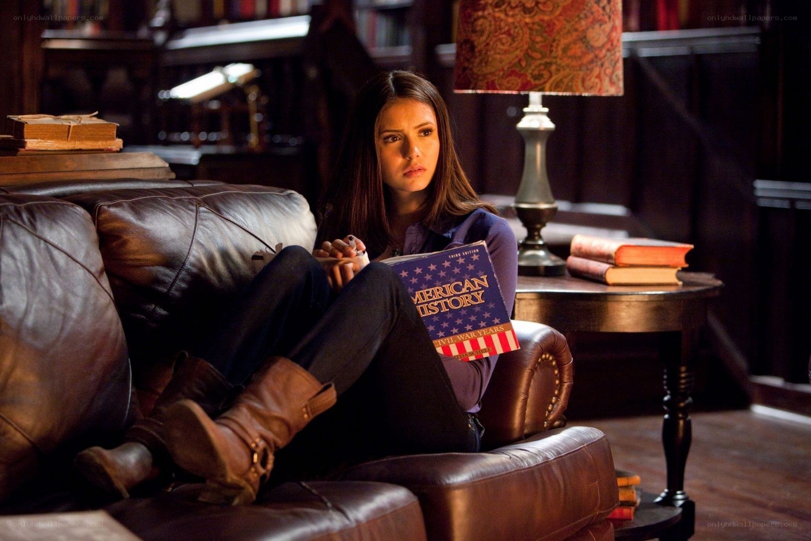 woman reading history book