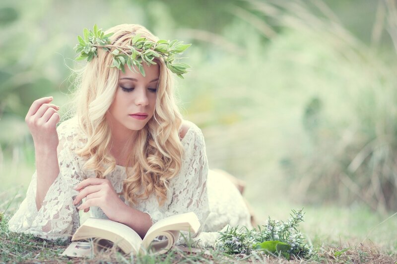 Woman reading in a field