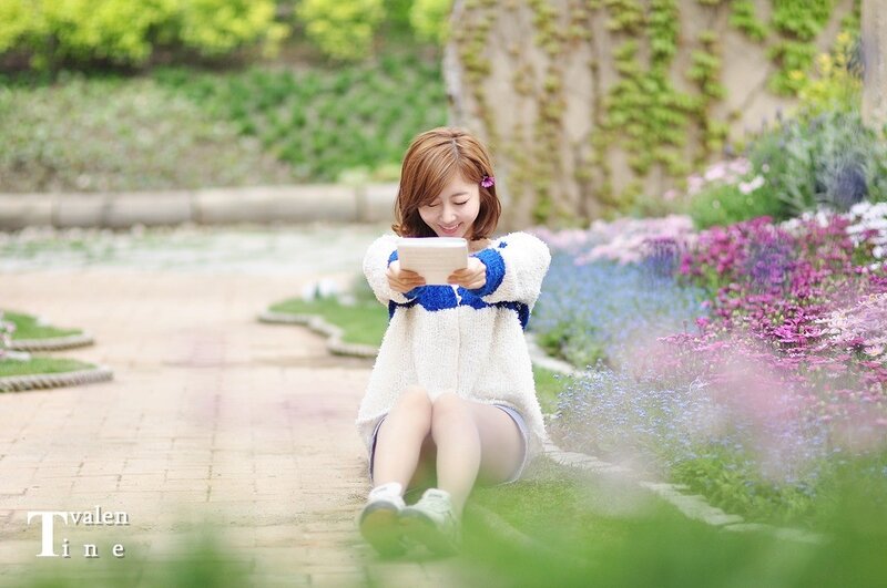 Woman reading in a garden