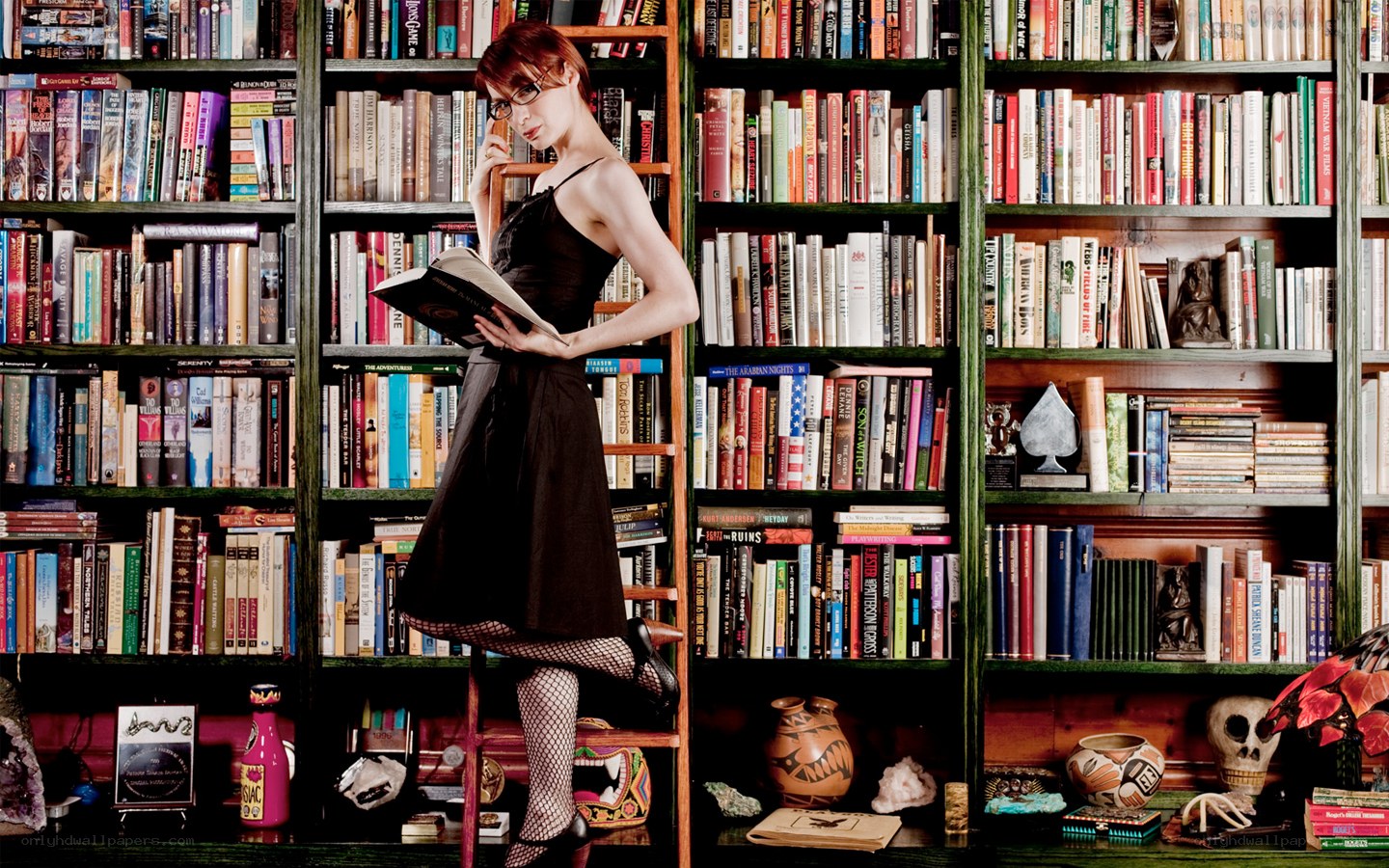 Woman reading in a library