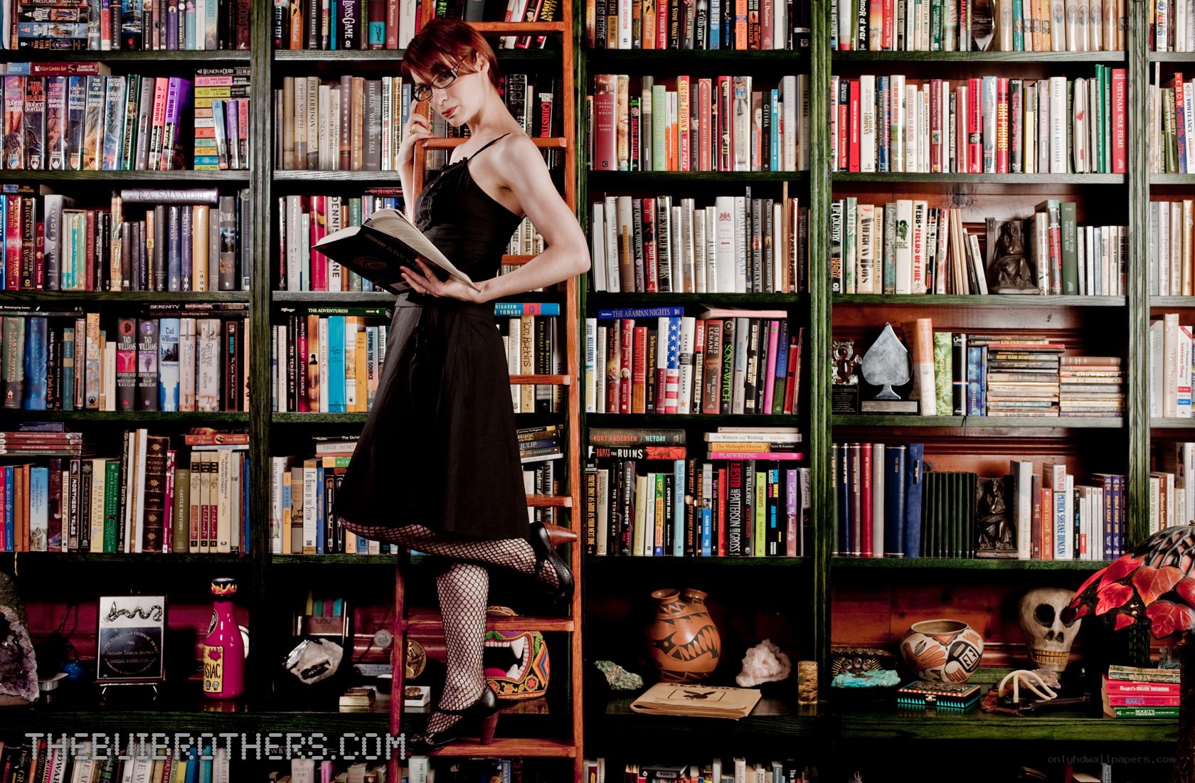 Woman reading in a library