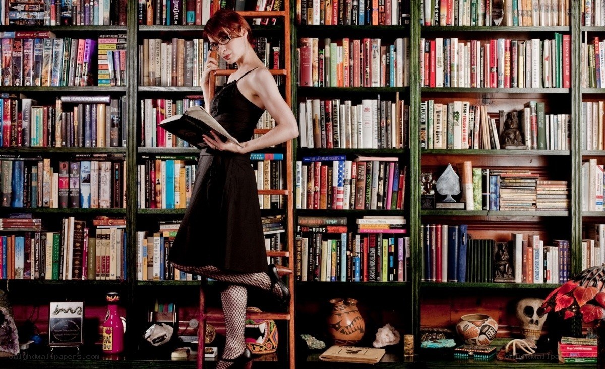 Woman reading in a library