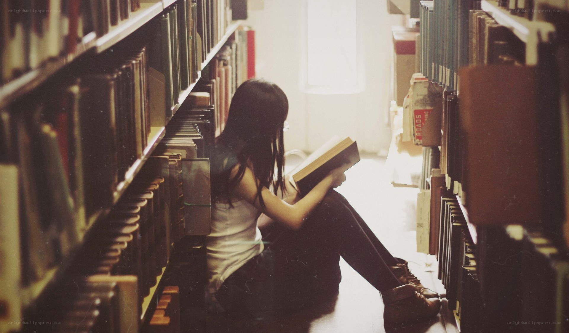 Woman reading in a library