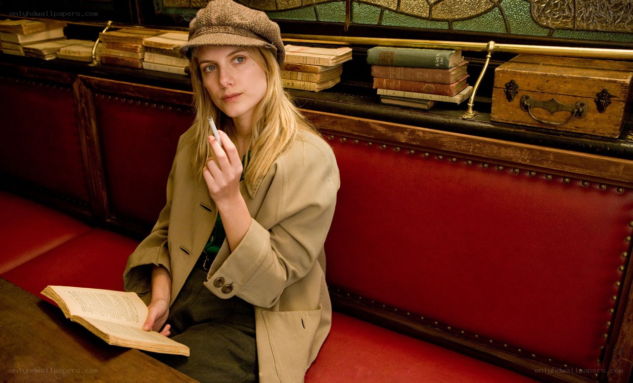 Woman reading in a library
