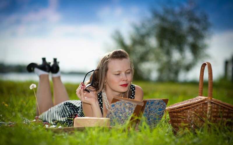 Woman reading in a park