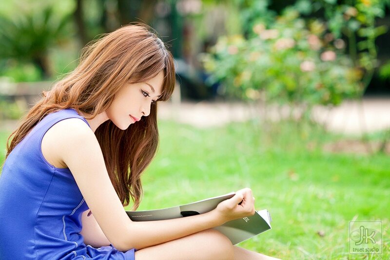 woman reading in a park