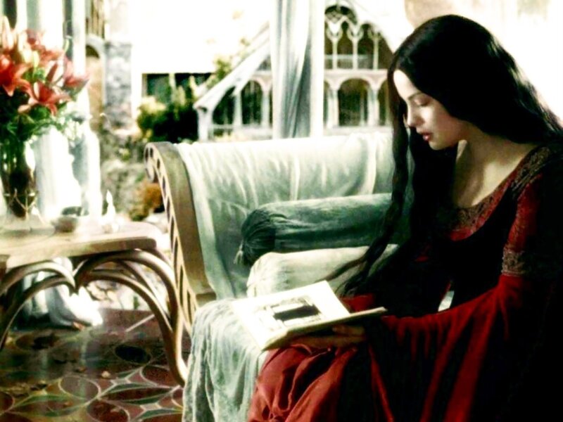 woman reading in a sunlit room