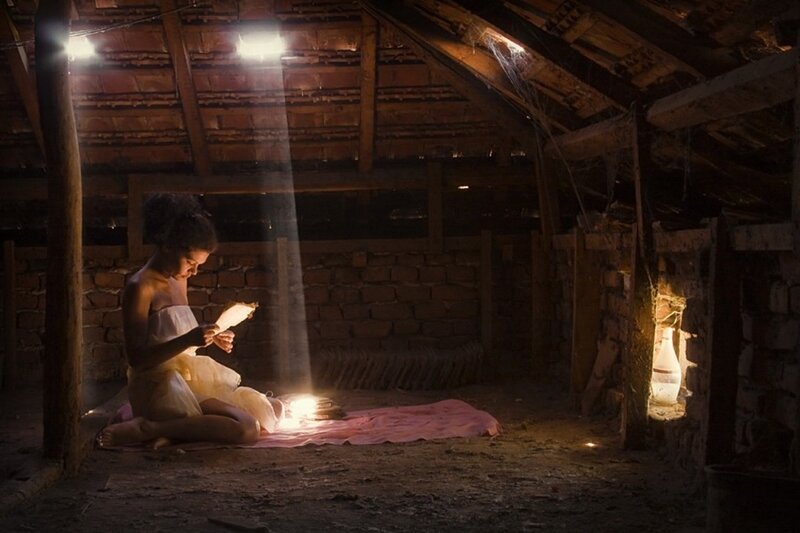 Woman Reading in Attic