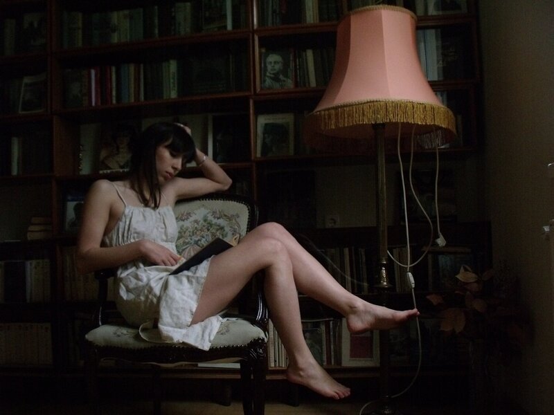 Woman Reading in Chair