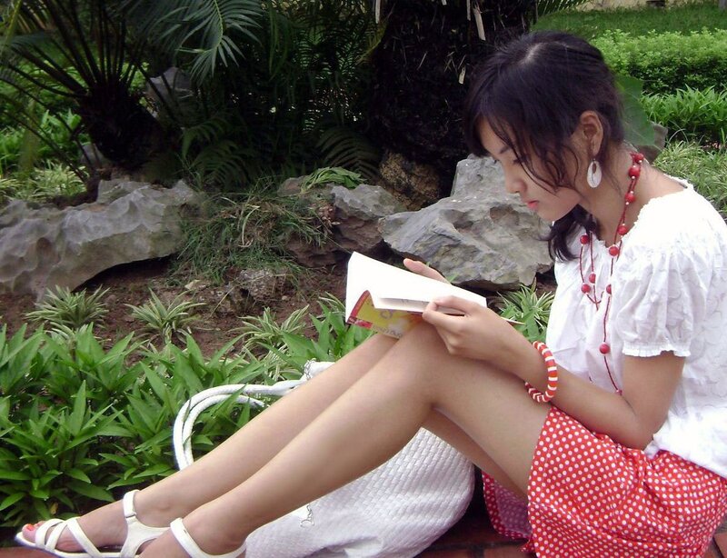 woman reading in garden
