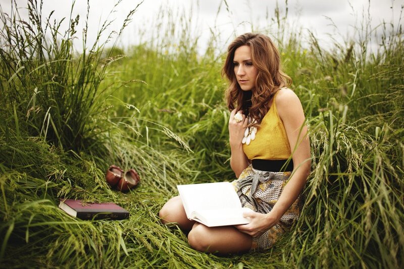 Woman Reading in Grass — Green, Serene, Afternoon