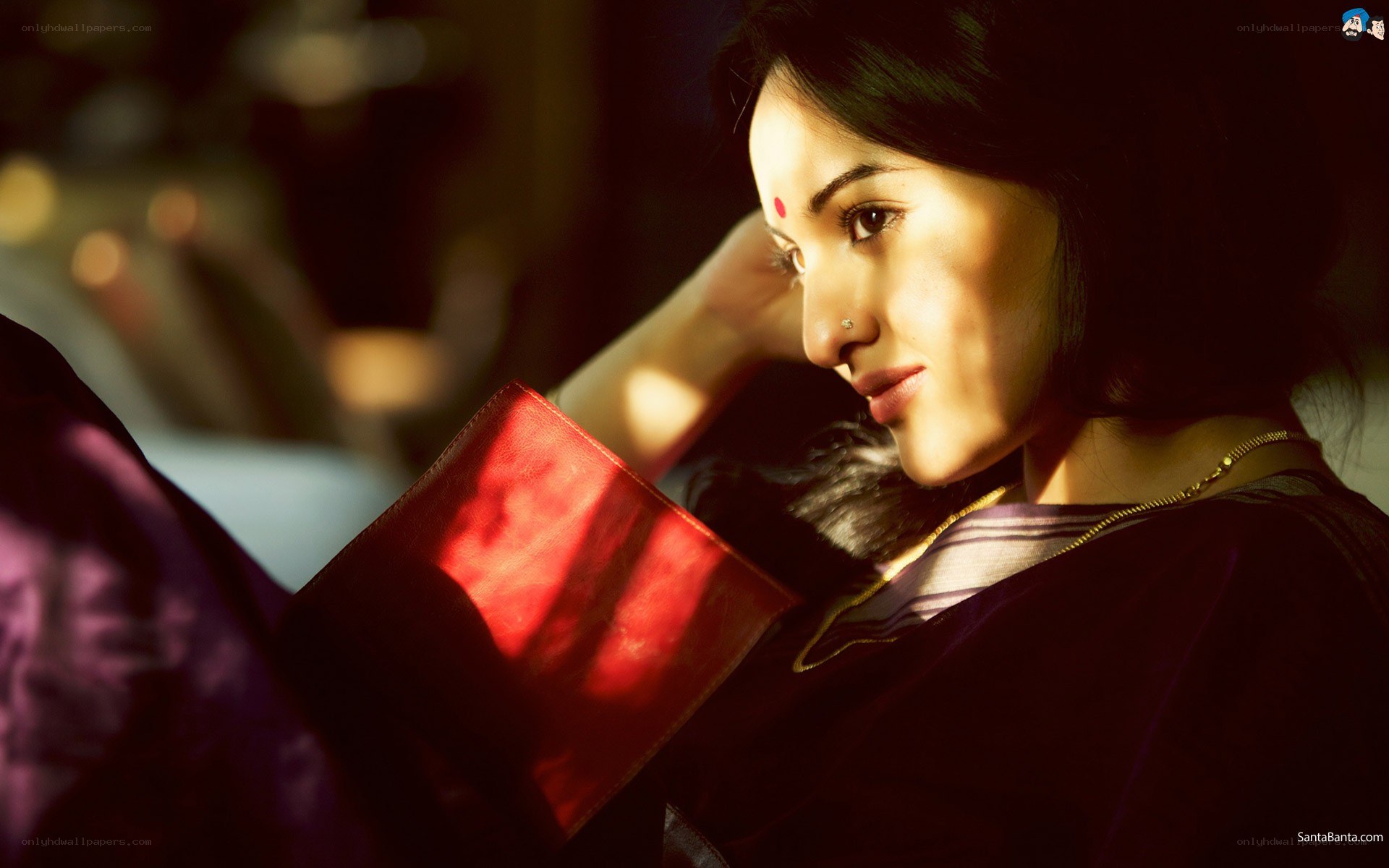 woman reading in warm light