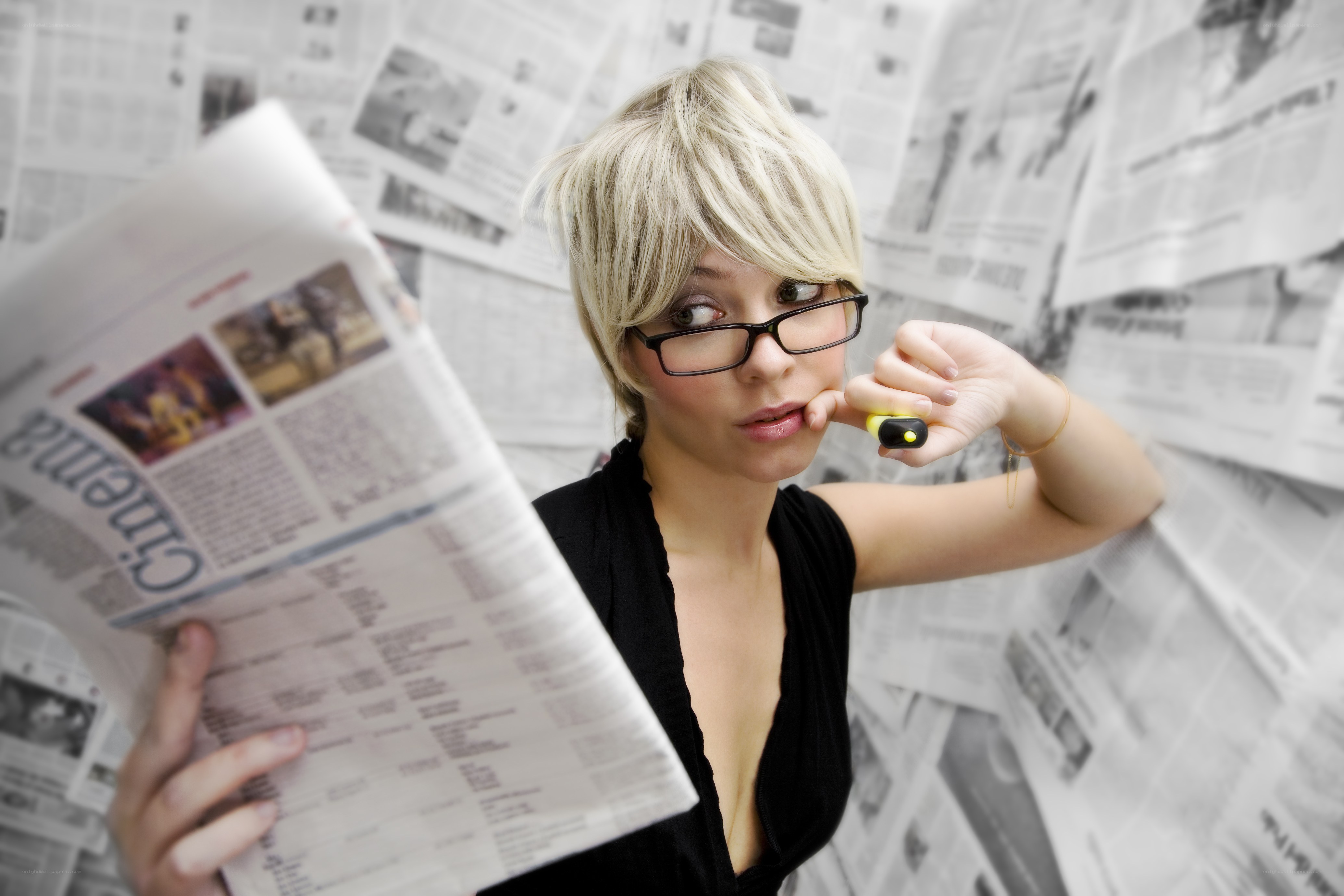 woman reading newspaper
