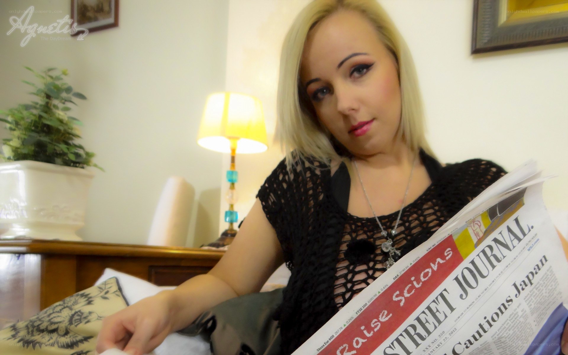 woman reading newspaper